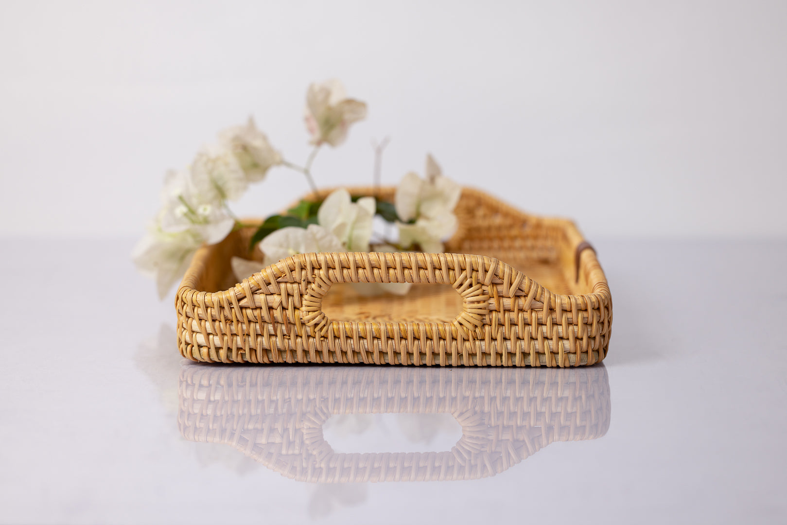 Montessori rattan tray side view with handle