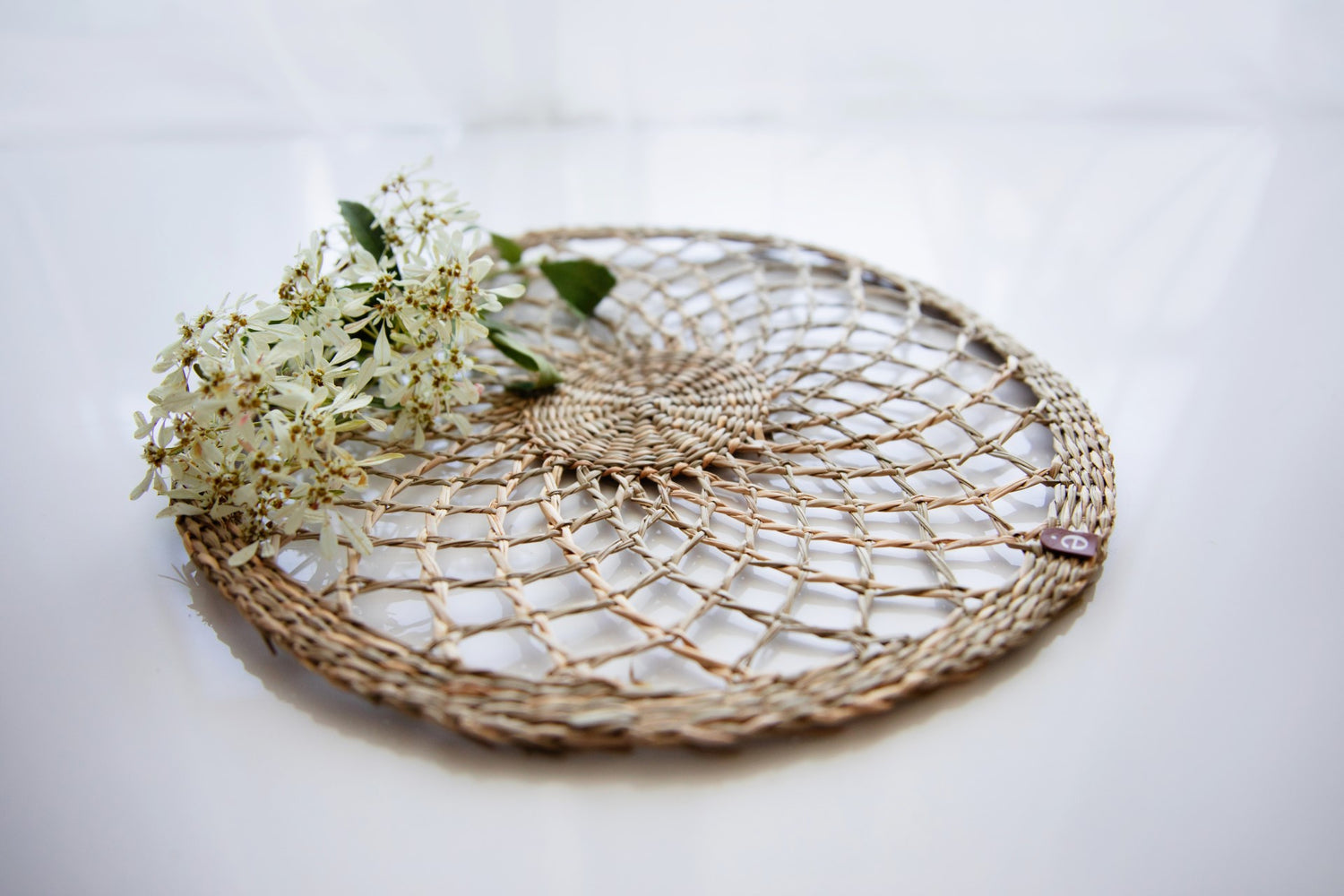 Close up of Montessori seagrass dish on an angle