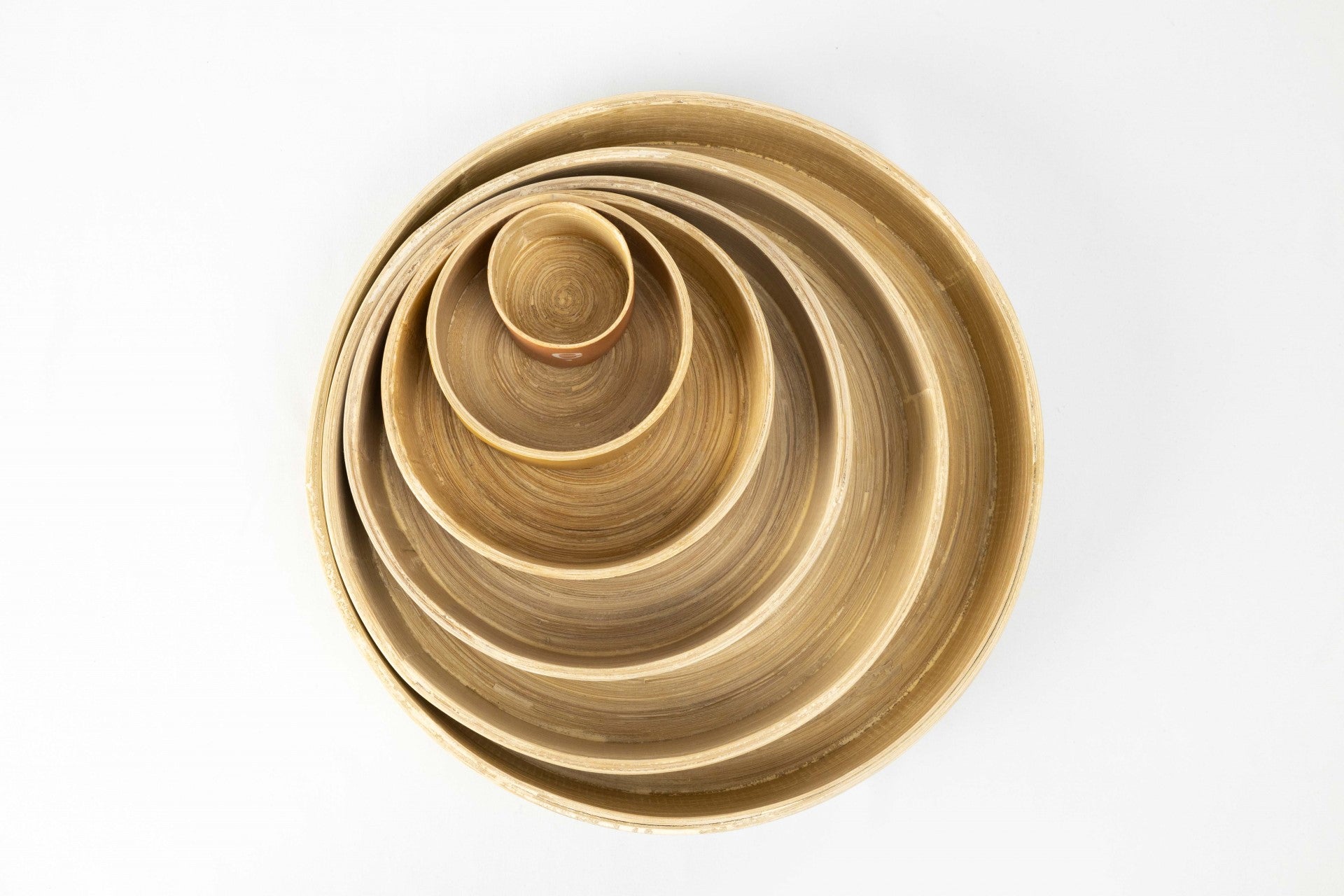 Top-down image of 6 set Montessori round spun bamboo set